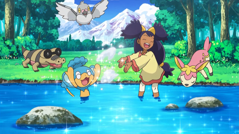 File:Young Iris playing with Pokemon.png